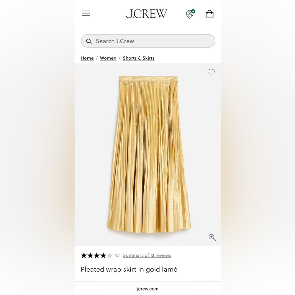 Pleated wrap skirt in gold lamé